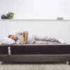 Man-sleeping-on-Sleep-Firm-Mattress-1